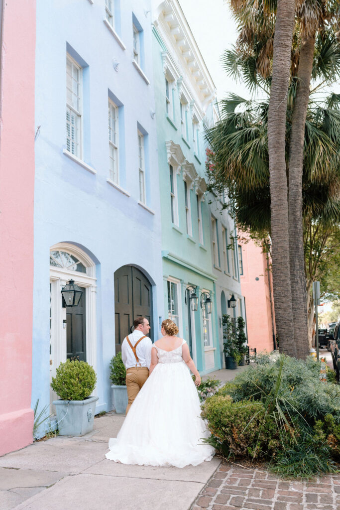 Couple at Rainbow Row in downtown Charleston South Carolina wedding photography