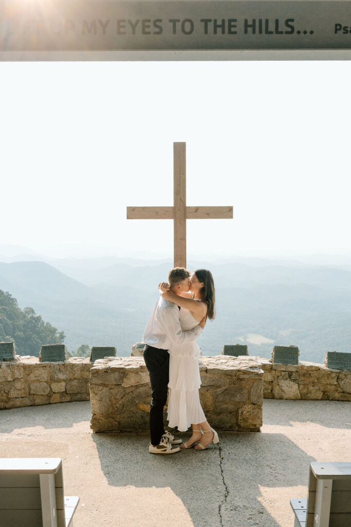 Couple posing for engagement photography at Pretty Place Chapel outside Greenville South Carolina