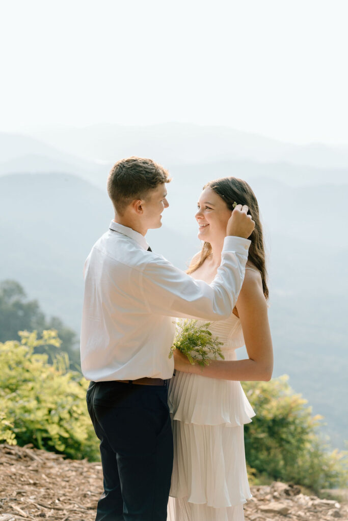 Couple posing for elopement photography at Pretty Place Chapel outside Greenville South Carolina
