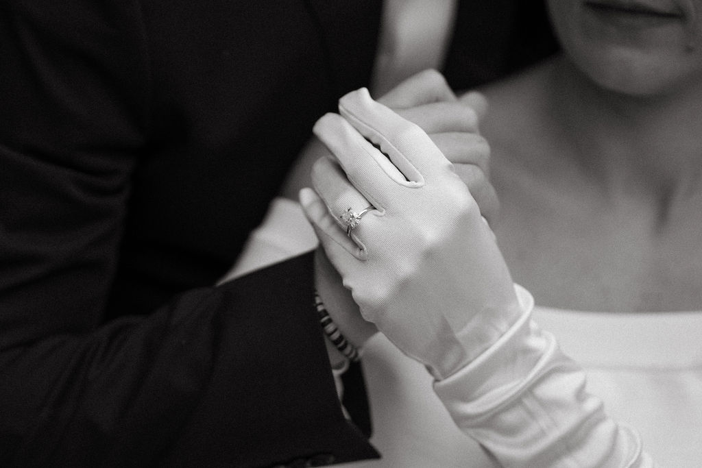 Classy couple posing for main street engagement couple session Downtown Greenville, South Carolina