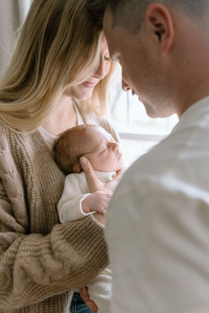 Family at newborn photos at a winter newborn session in Greenville, South Carolina