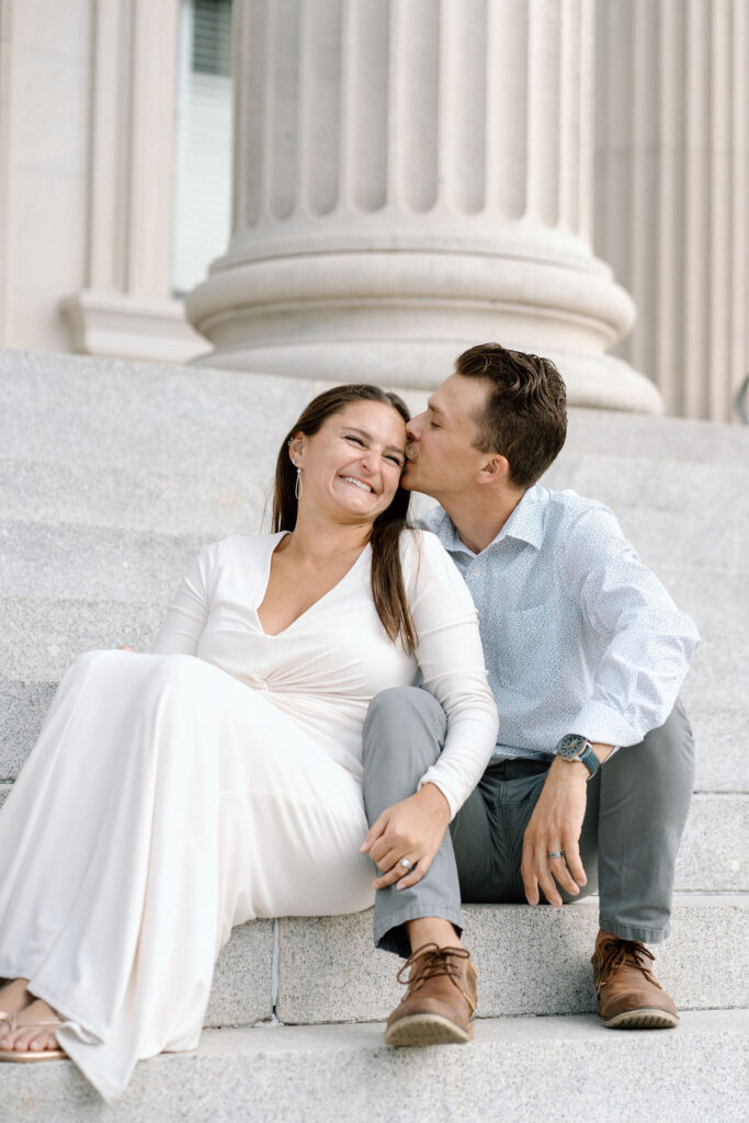 Charleston couple posing in downtown Charleston, SC during couples winter session.