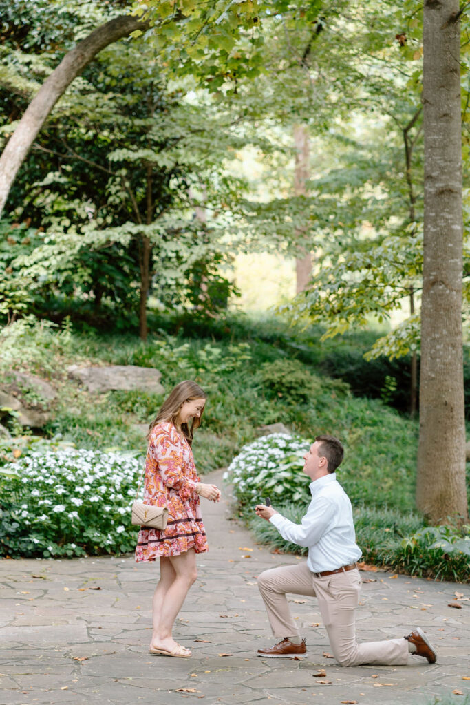 Falls Park summer proposal and engagement photos in Downtown Greenville, South Carolina