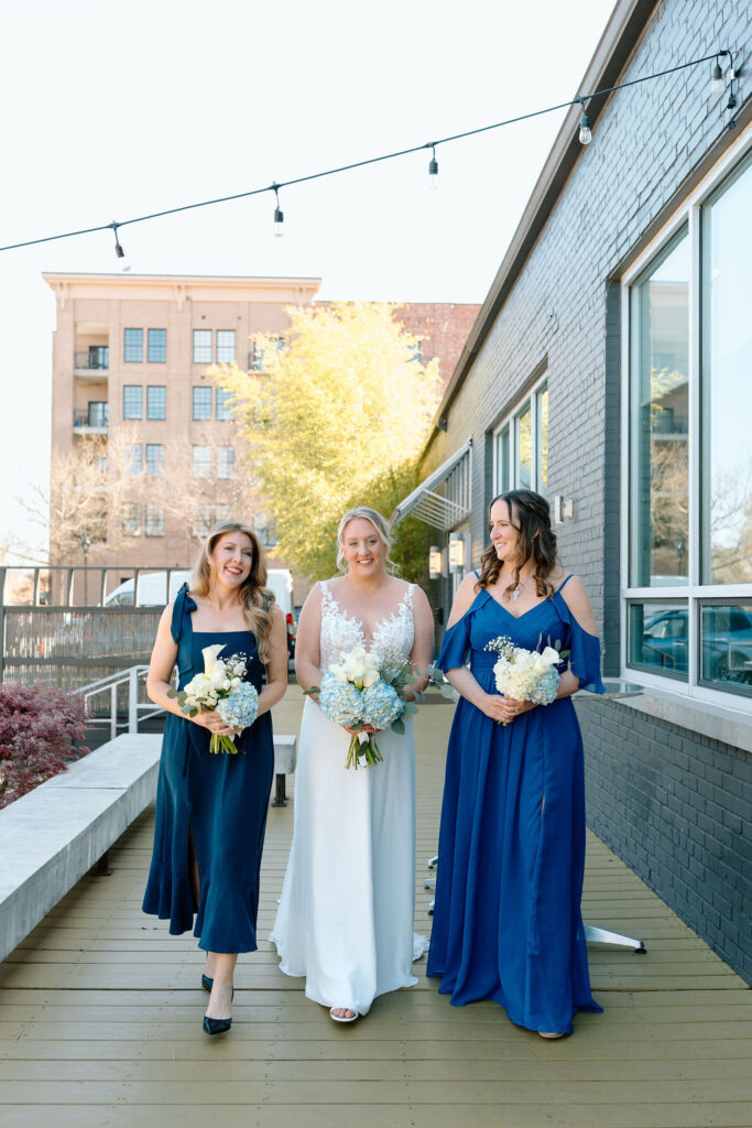 Modern mismatched bridesmaid dresses in coordinated wedding colors creating a modern and personalized wedding palette
