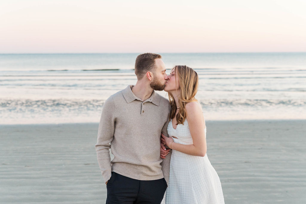 Romantic sunset engagement photos of a couple on the beach in Charleston, South Carolina
